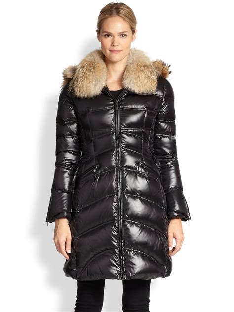 Dawn levy coat - The Aspen puffer coat from Dawn Levy features lush shearling trim at the collar, hood, and cuffs. A slim silhouette defines this warm, down-filled style. Funnel neck; Attached hood; Long sleeves; Zip-front closure; Side welt pockets; 100% nylon; Fill: 90% down/10% feathers; Fur type: Dyed sheep; Fur origin: China; Dry clean by fur specialist ... 